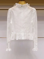 Camisa Branca com Gola Alta e Aplicações de Pérolas – Sofisticação e Charme