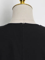 Blusa Minimalista com Plumas – Estilo e Sofisticação