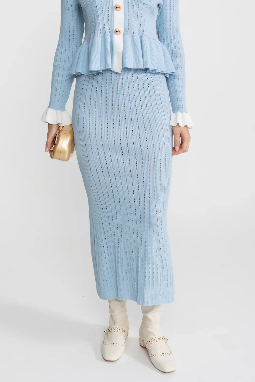 Conjunto Tricô de Duas Peças: Casaco com Peplum e Saia Sereia Midi